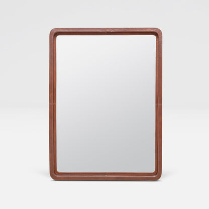 Rectangular mirror with a leather frame on a white background