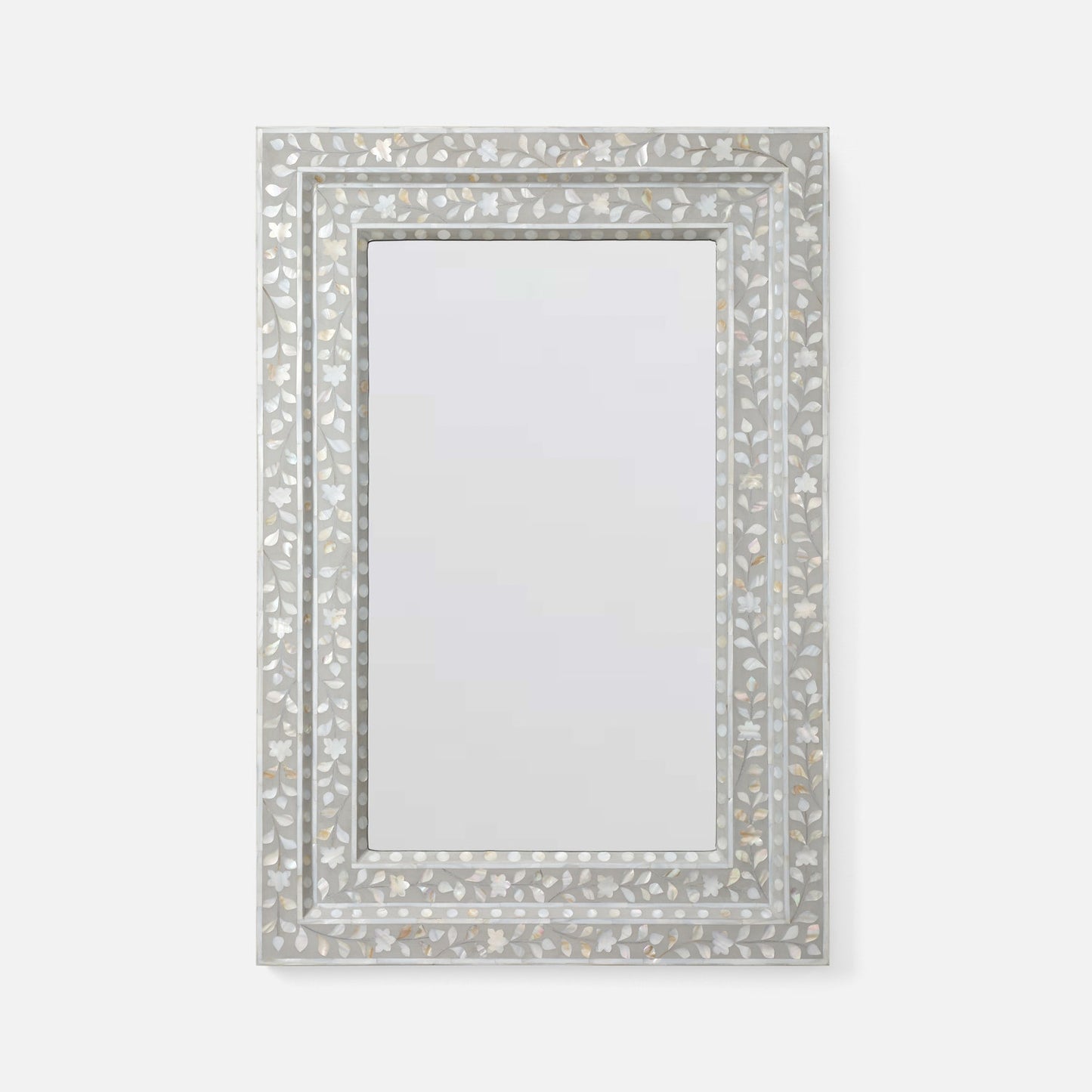 A rectangular wall mirror with an ornate silver-toned frame made of inlay mosaic pieces, shown against a plain light gray background.