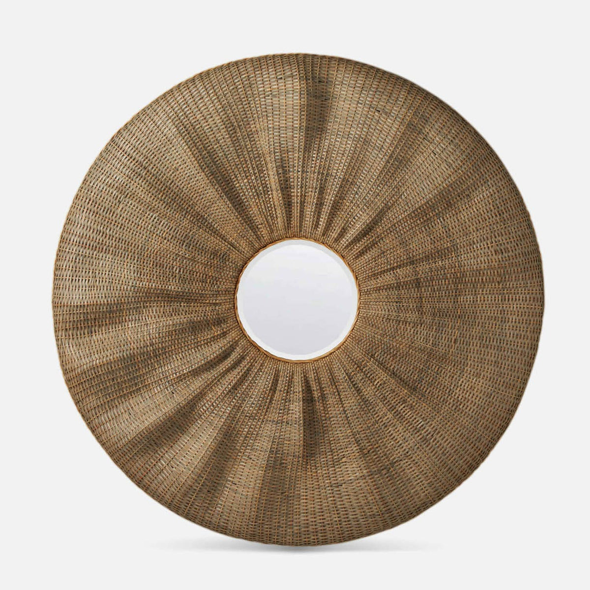 A round woven rattan wall mirror with a sunburst design and a central reflective mirror, shown against a light gray background.