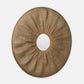 A round woven rattan wall mirror with a sunburst design and a central oval mirror cutout, shown against a light gray background.