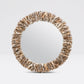Round mirror with a natural, organic frame on a light gray background