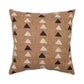 Decorative pillow with triangle pattern on a brown background