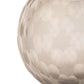 Close-up of a textured glass sphere on a white background