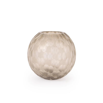 A round, hammered glass vase in a frosted champagne beige color, centered on a clean white background.