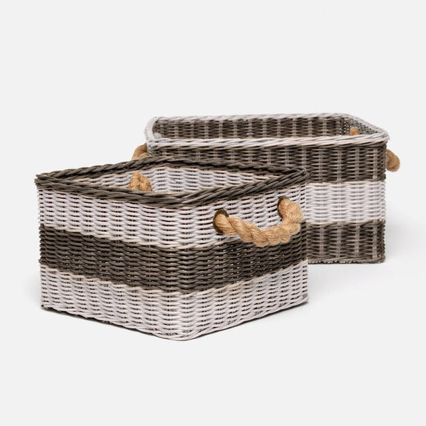Two woven baskets with striped pattern and rope handles on a white background
