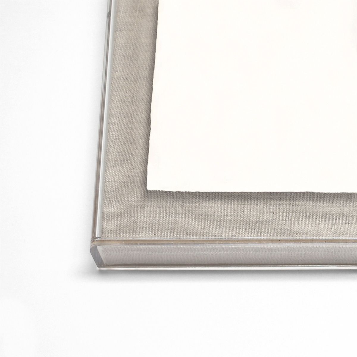Close-up of a gray fabric-framed picture on a white background