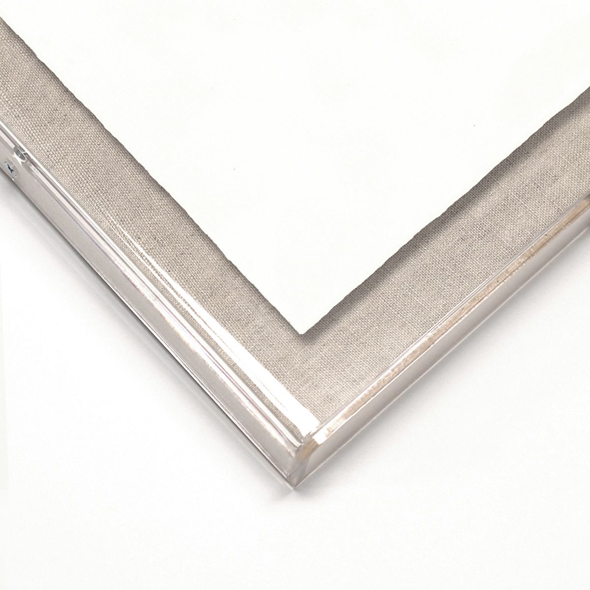 Close-up of a silver picture frame corner on a white background
