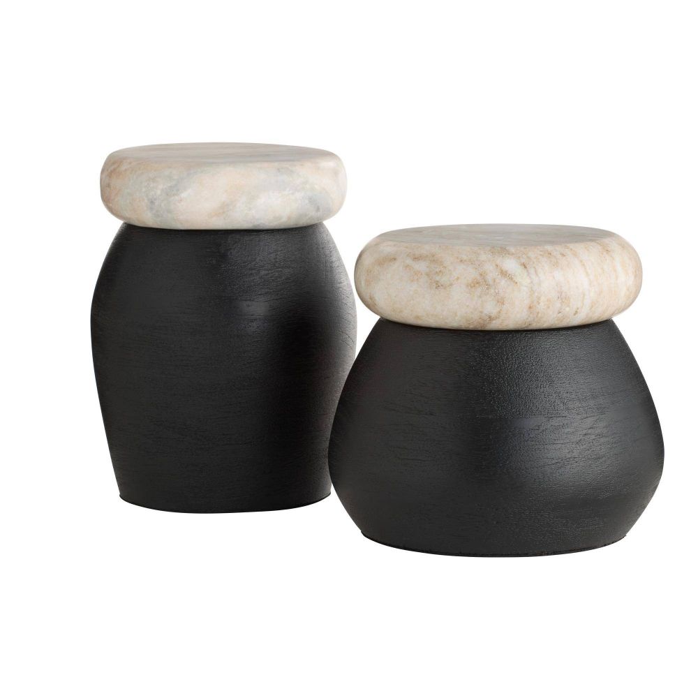 Two black stools with beige marble tops on a white background