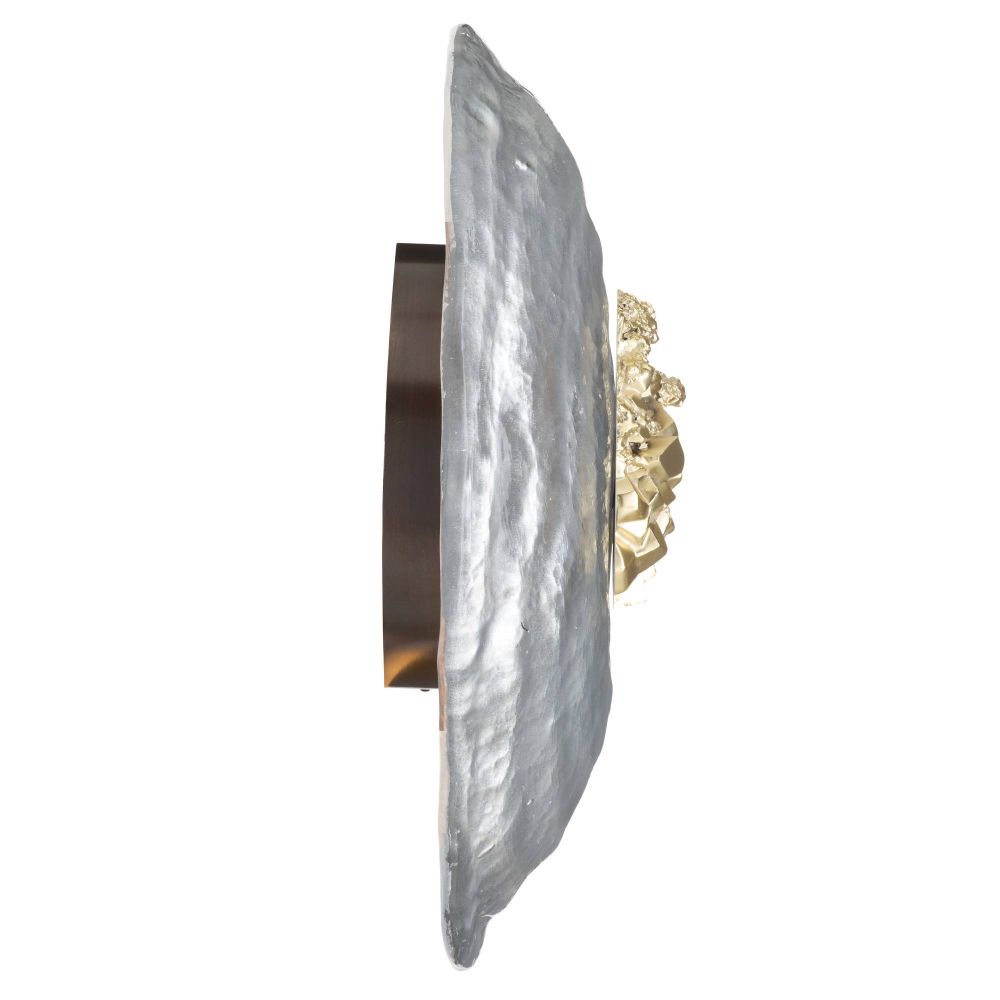 Decorative wall sconce with metallic finish on a white background
