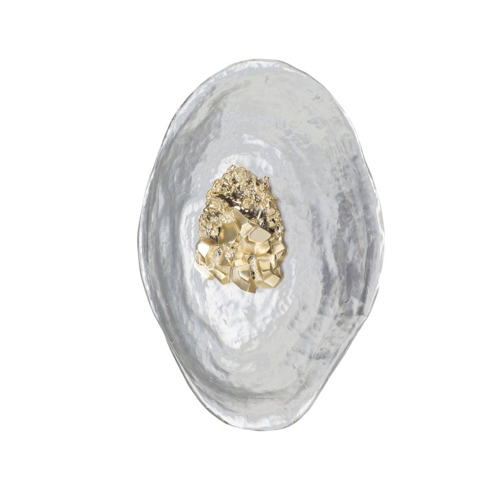 Decorative wall piece with gold mineral-like material on a white background