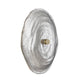 Decorative wall hook with a textured silver disc and gold accent on a white background