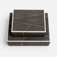 Two dark mushroom shagreen boxes with white inlay on a light gray background