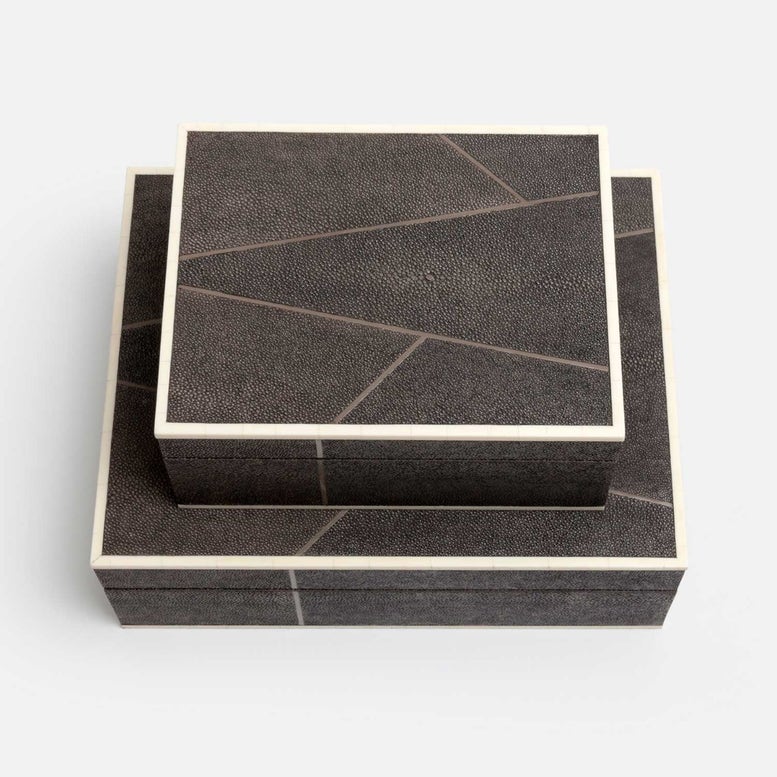 Two dark mushroom shagreen boxes with white inlay on a light gray background