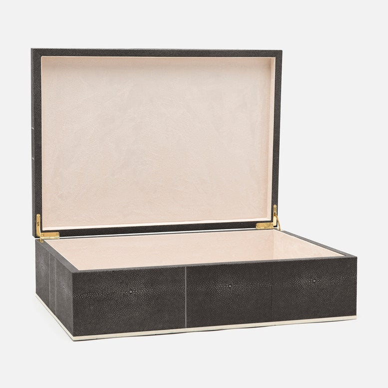 Decorative box with a black textured exterior and beige interior on a white background