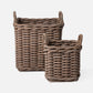 Two woven baskets with handles on a white background