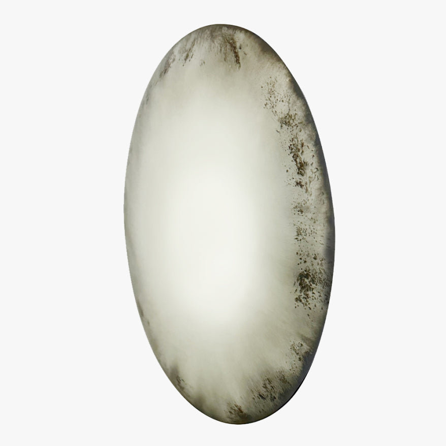 Oval-shaped stone with a rough texture on a white background