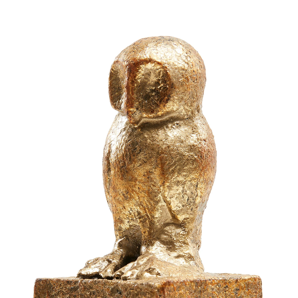 Gold owl statue on a white background