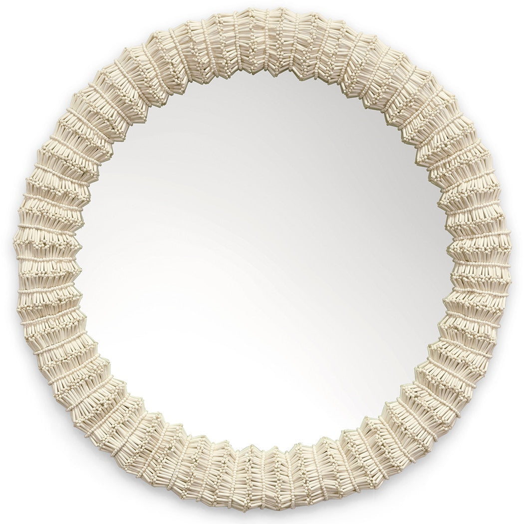 Round mirror with a textured beige frame on a white background