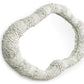 Round woven object on a white background