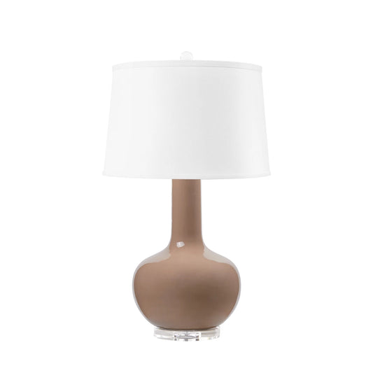 Table lamp with a white shade and brown base on a white background