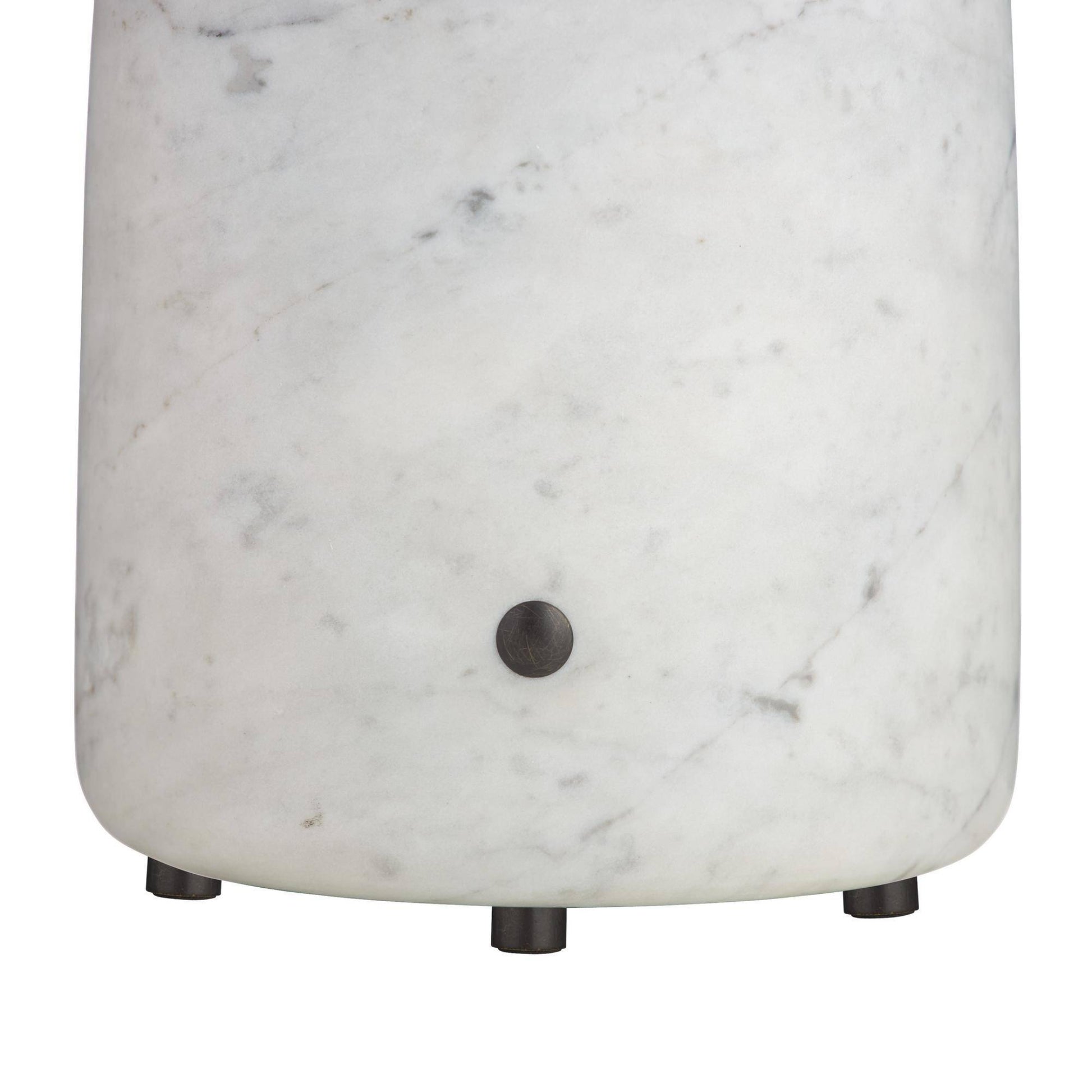 Marble-patterned cylindrical object with a dark knob on a white background