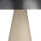 Close-up of a lamp with a metallic base and beige lampshade on a white background