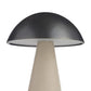 Table lamp with a dark gray dome shade and beige cylindrical base on a white background