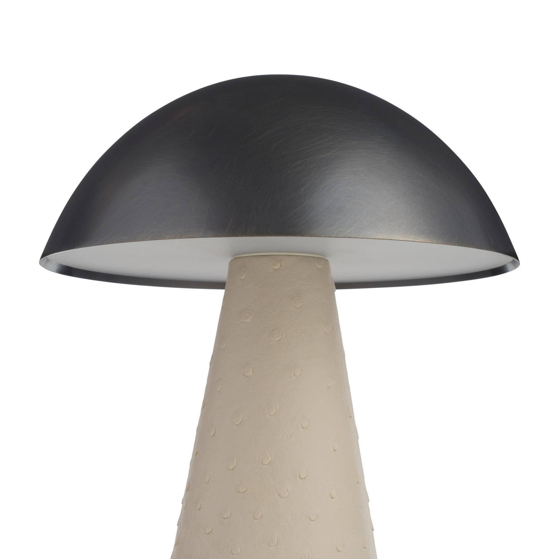 Table lamp with a dark gray dome shade and beige cylindrical base on a white background