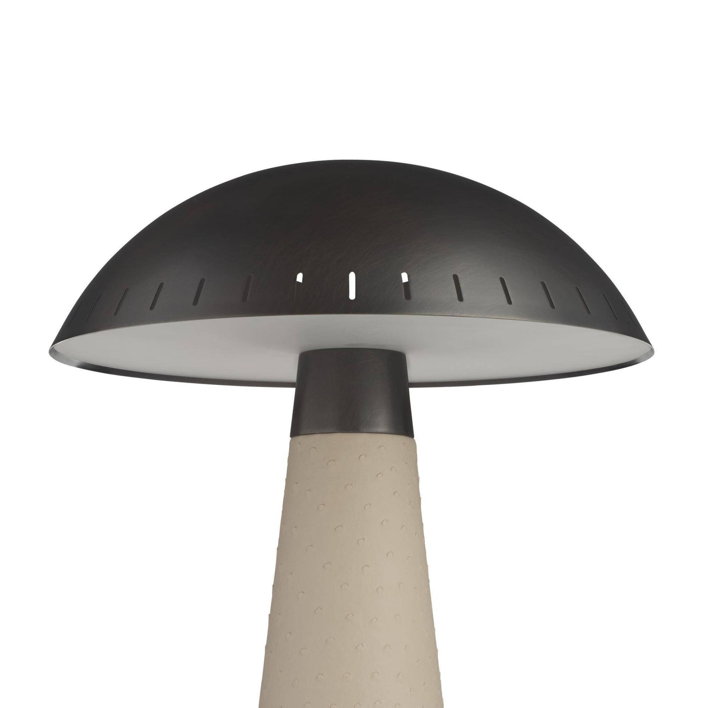 Decorative lamp with a black shade and beige base on a white background