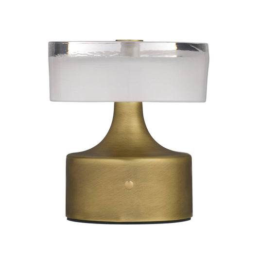 Table lamp with gold base and white shade on a white background