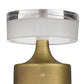 Decorative lamp with gold base and white shade on a white background