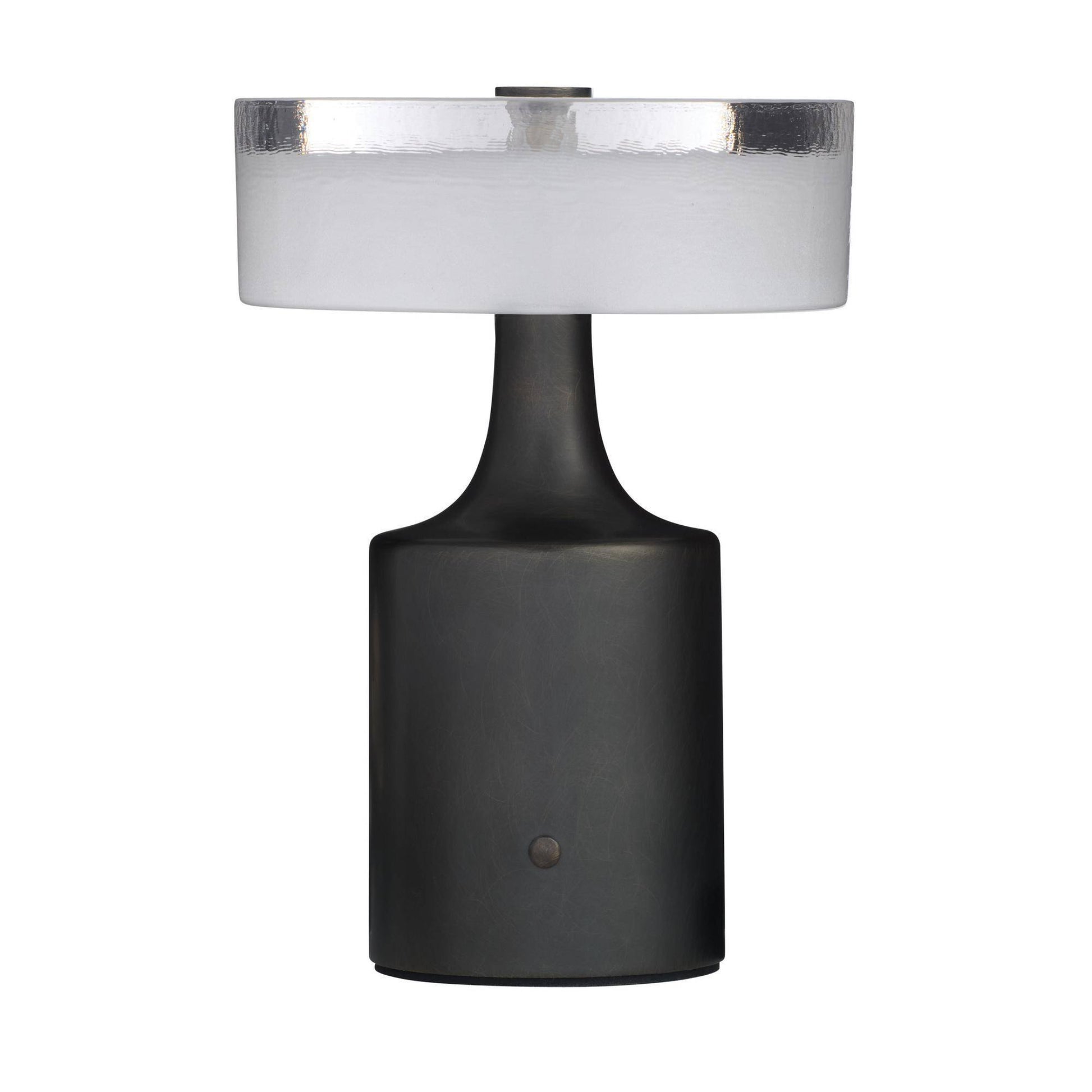 Table lamp with black base and white shade on a white background
