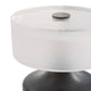 Round table with white top and black base on a white background