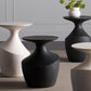 Set of modern side tables in various colors with a neutral background