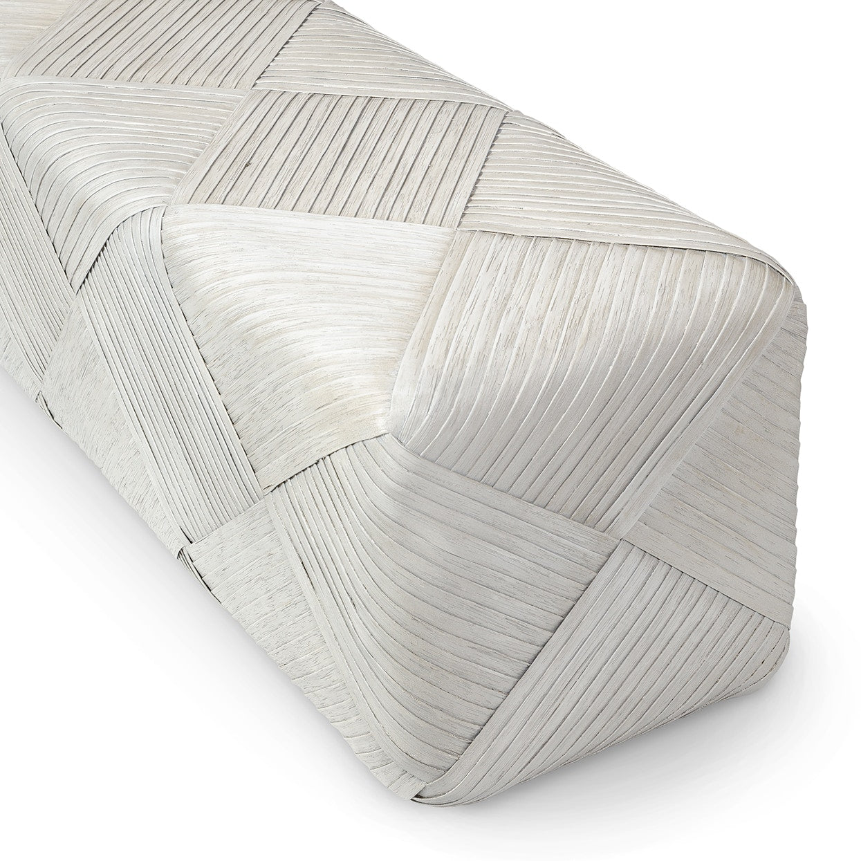 Rectangular woven pillow with a geometric pattern on a white background