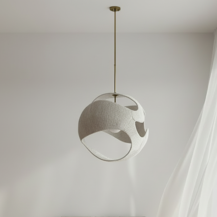 Modern pendant light hanging in a minimalistic room with white walls and curtains.