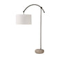 Floor lamp with a white shade and stone base on a white background