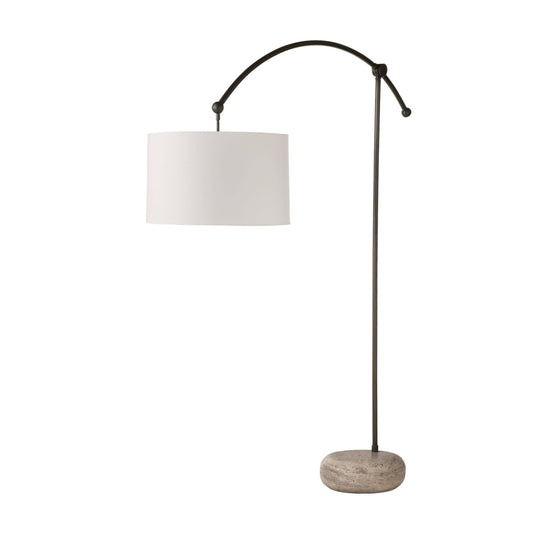 Floor lamp with a white shade and stone base on a white background