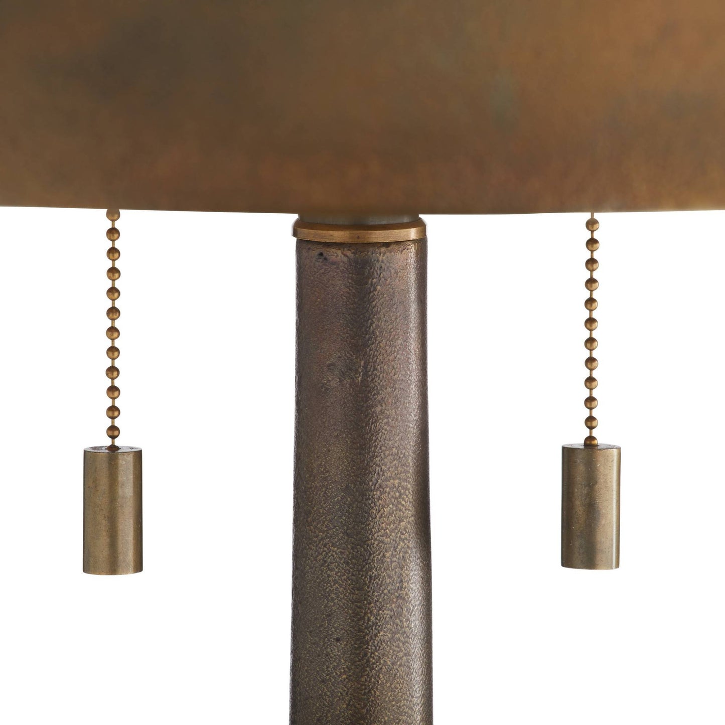Close-up of a lamp with a brown shade and metallic pull chains on a white background