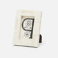 Beige picture frame with a decorative letter 'P' on a white background
