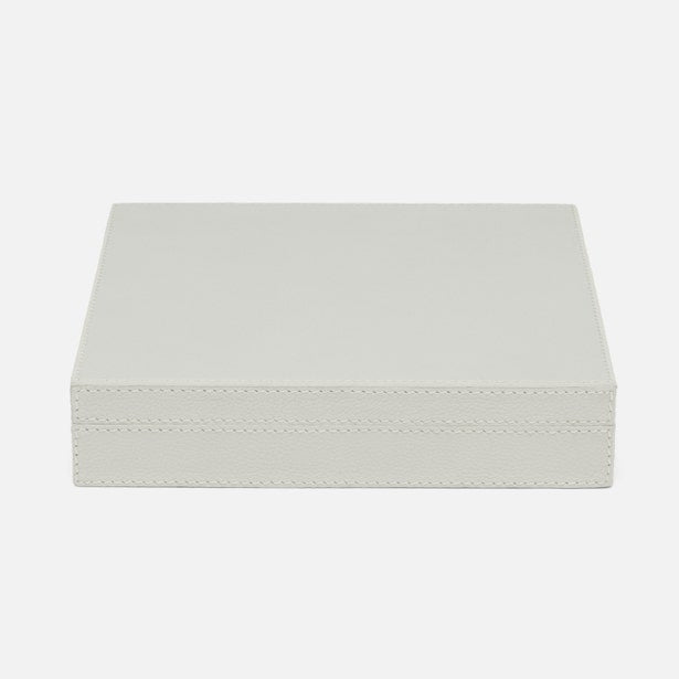 Light gray jewelry box with decorative stitching on a white background