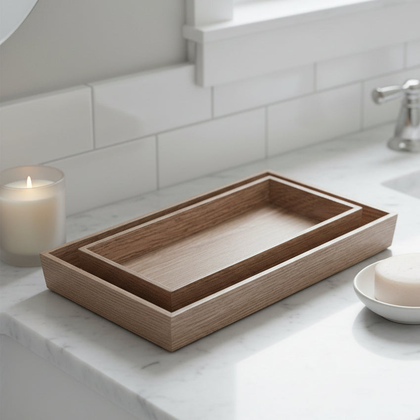 A set of three nested rectangular wooden trays with a natural oak grain finish, shown on a light gray background.
