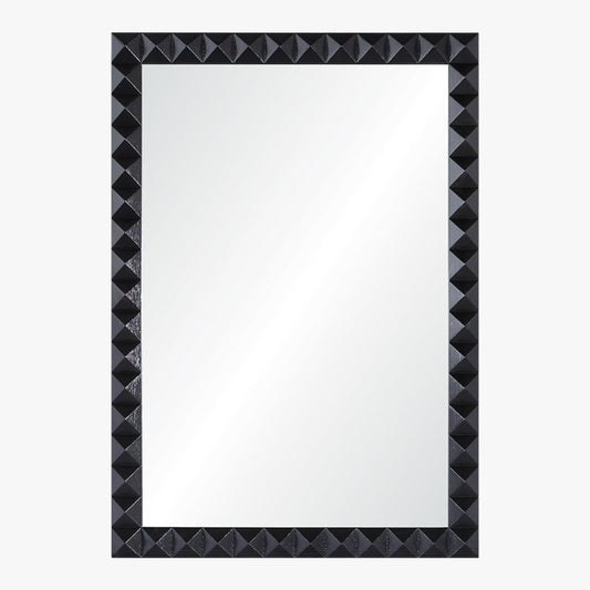Rectangular mirror with a black, pyramid-patterned frame on a white background