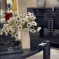 Video of Rollo Ottomans, Maud Vase (white with flowers) and Black Matte Luca Sculpture on Table
