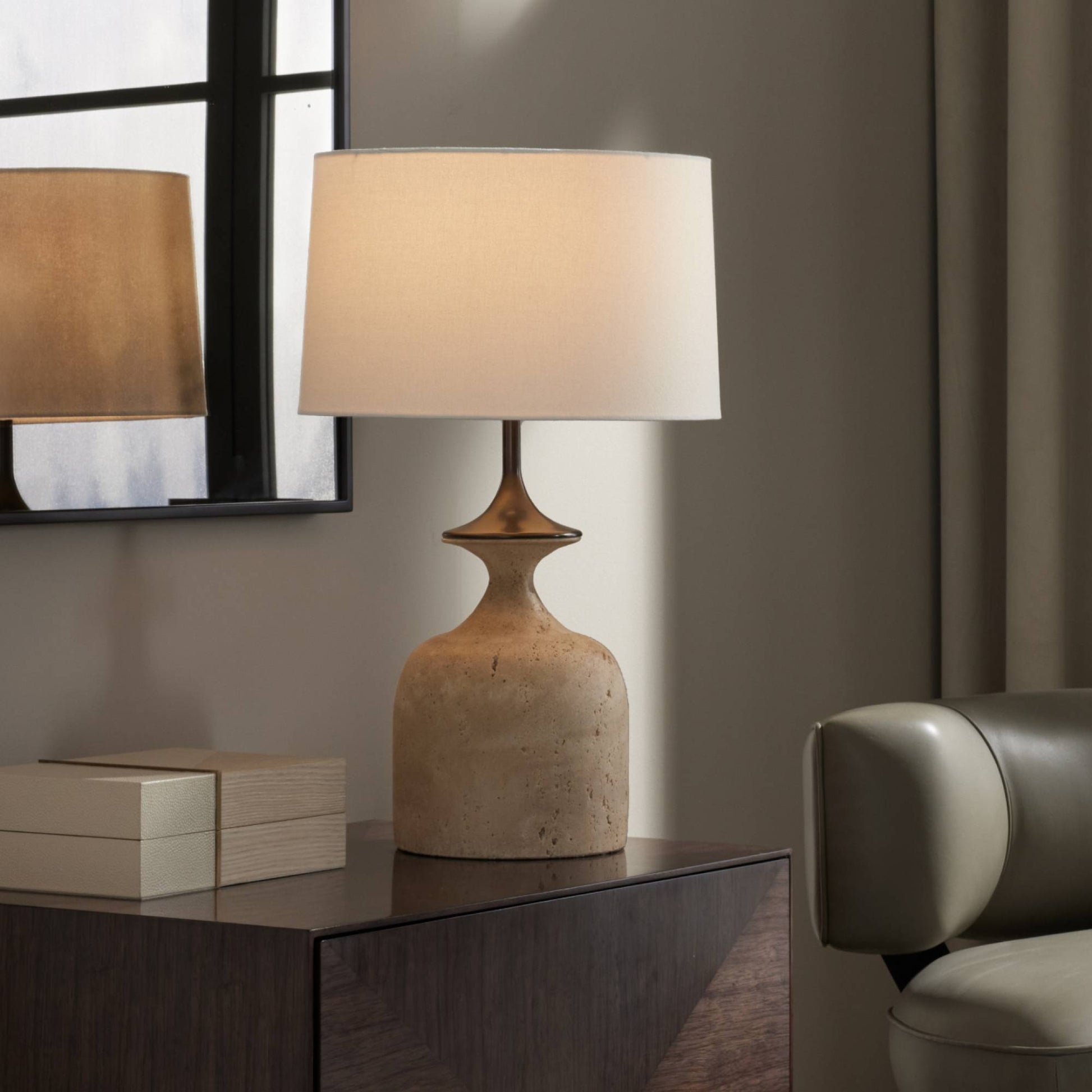 Decorative lamp on a wooden side table with a neutral background