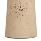 Close-up of a textured beige stone object on a white background