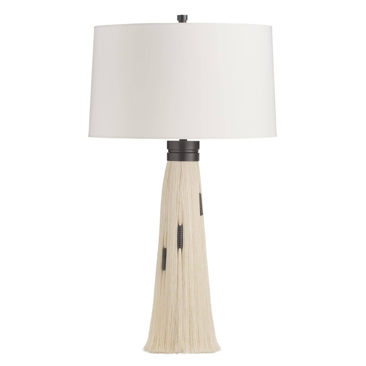 Table lamp with a white shade and beige base on a white background