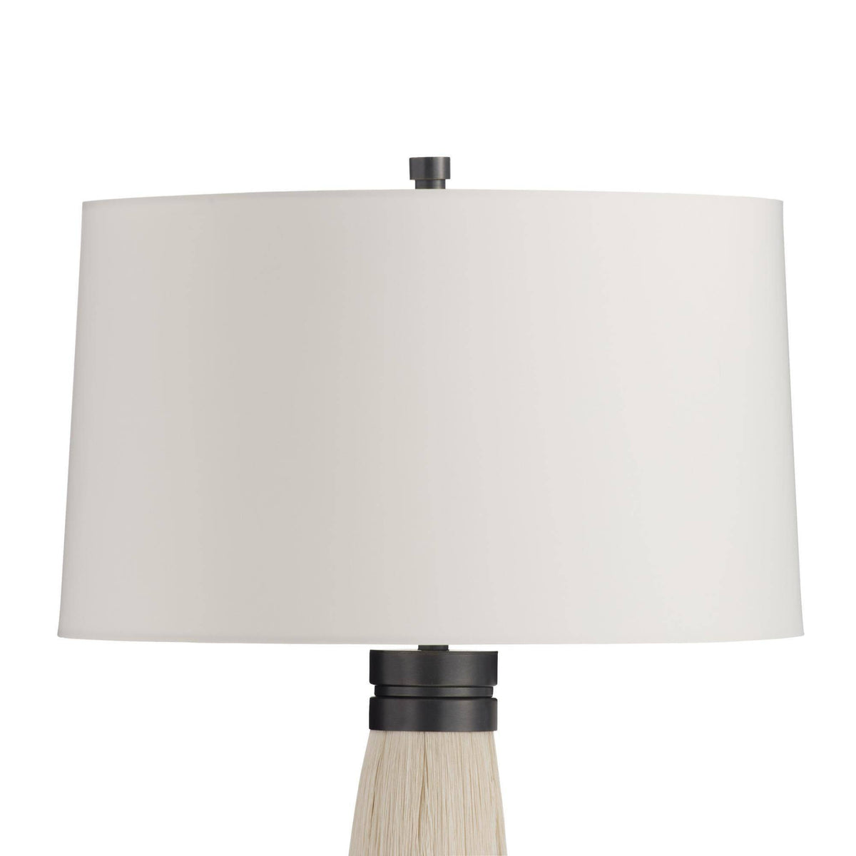 Table lamp with a white shade and black base on a white background