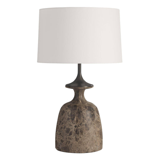Table lamp with a textured brown base and white shade on a white background