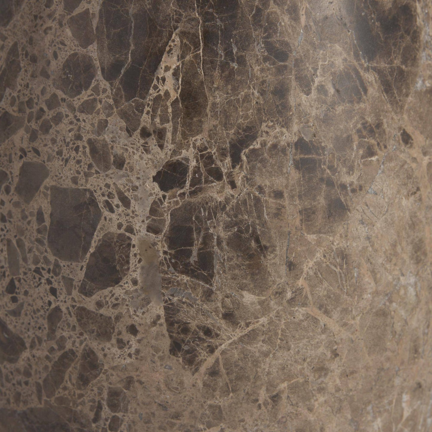 Close-up of a brown marble-like stone surface